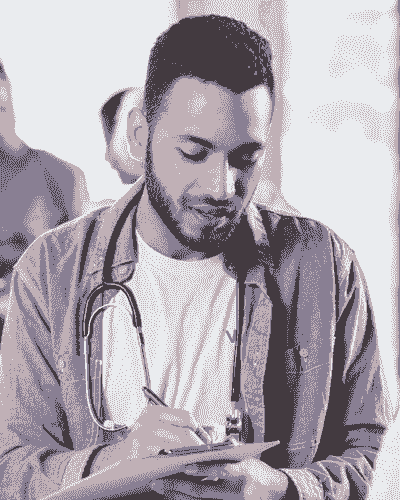 A man with a stethoscope is looking down.